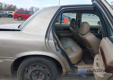 2004 Mercury Grand Marquis Gs z USA, uszkodzony, nr VIN 2MEFM74W14X657398